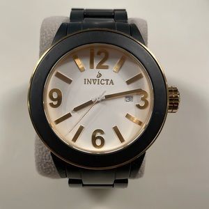 Men’s Invicta Model 1192. Good condition. Black and gold.